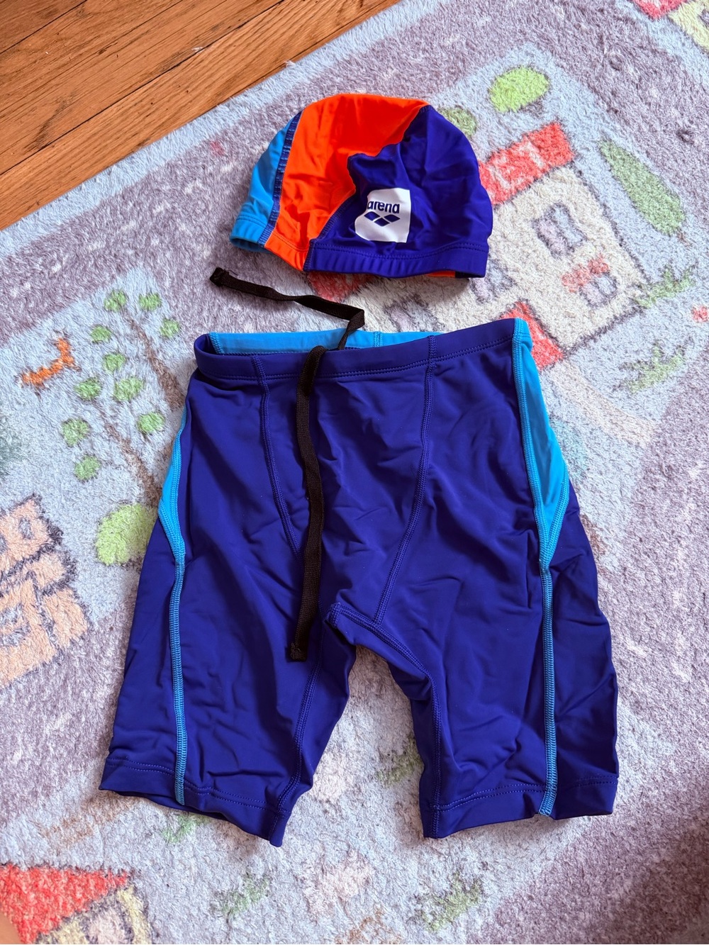 Kids Blue Swim Jammer with Light Blue & Orange Accents and Matching Cap